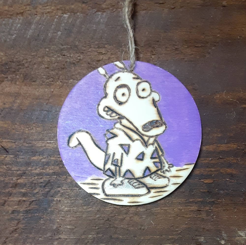 Woodburnt and painted ornament